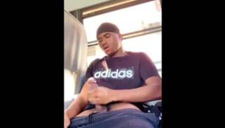 Black guy strokes on school bus headed to school