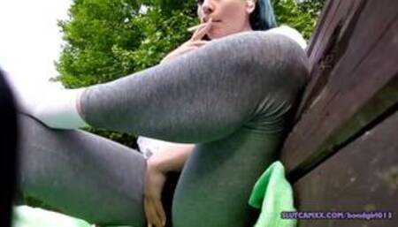 Wetting her yoga pants outdoor