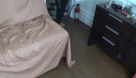 Salem in Her Catsuit Smokes and Puts Boots on Her Bare Feet