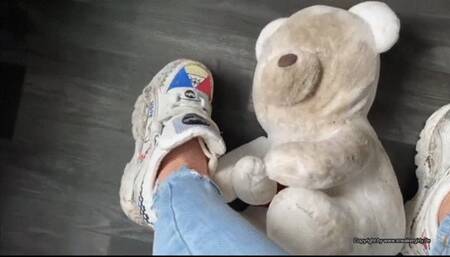 a soft toy has to suffer from cute, very dirty buffalo boots on his birthday