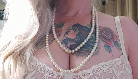 Irresistible Blonde Smoker Milf in her see-through lingerie, smoking a red Marlboro