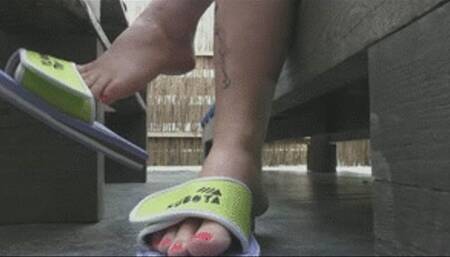 In public place dangling flip flops wmv