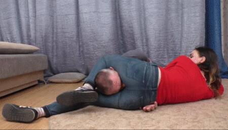 Male's head is blocked between tiny legs of a beautiful gal, vf1573x 1080p