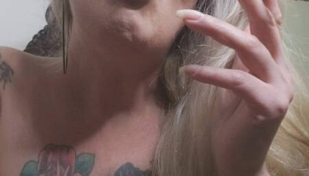 Blonde smoker milf, naked with her provocative topless