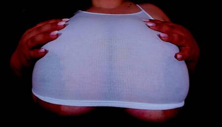 Teasing you in a white see-through top with my huge boobs