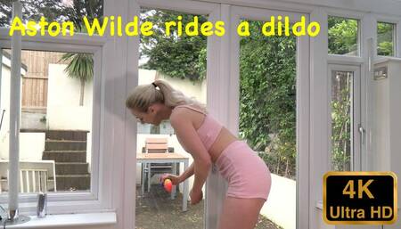 Aston Wilde rides a dildo