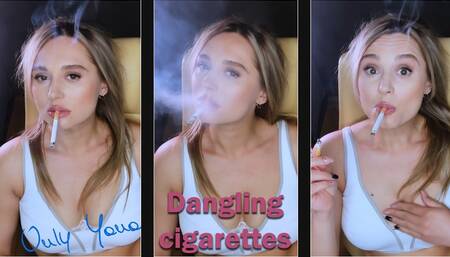 2 dangling cigarettes