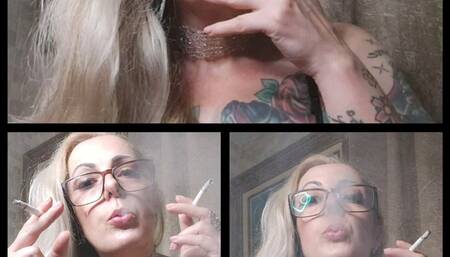 Very sexy blonde smoker smoking two marlboros at once