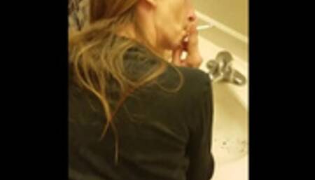 Cute Girl Fucked In Bathroom While She Smokes A Cigarette