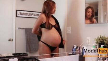 Huge Pregnant Girl Tries Clothes On