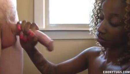 Shy Ebony Gives A Topless Handjob