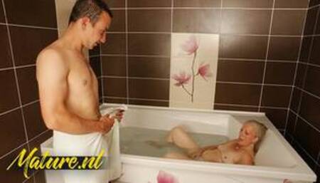 Hairy Cougar Fingering Herself In Bath Gets Surprised By Stepson
