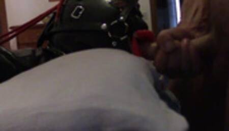 A close view of my wife taking my cock down her throat with a lip open mouth gag