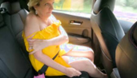 Lady Sonia plays with her magic wand in the car