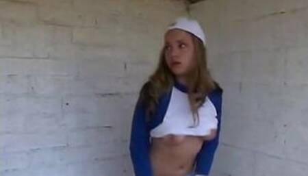 Little April rubs her pussy after baseball