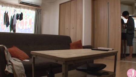 Cute amateur Japanese couple is having fun in their apartment