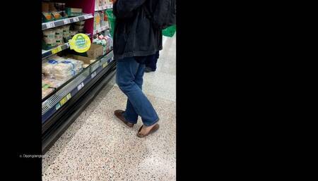Brown Clogs Dipping Shoeplay in the Supermarket