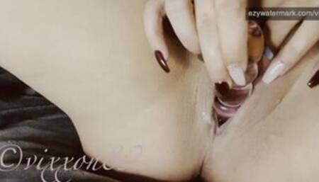 Sexy babe masturbates and makes pussy cream and squirt