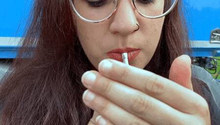 Enjoy this beautiful Italian girl! She is smoking for you!