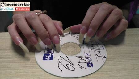 Nails In Action - claws leave scratches on the disk