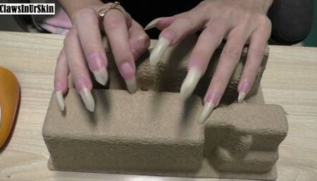 wild scratching of cardboard