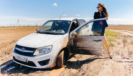 CAR STUCK  Julia got stuck in the mud doing a test drive