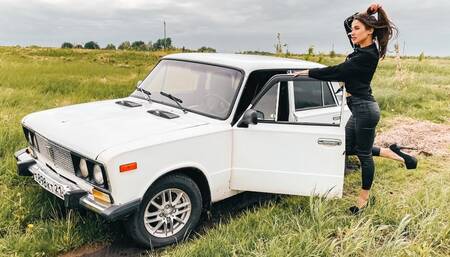 CAR STUCK  Tanya stuck in dirty and wet grass in high heels