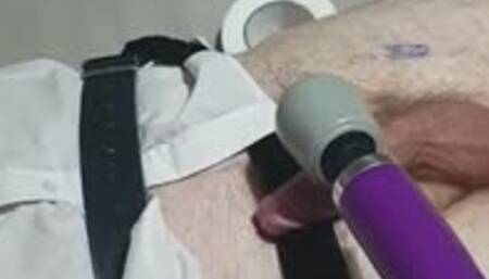 Wand used on strapped down guy in adult school uniform