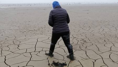 Boots and dried up lake