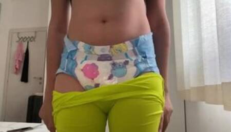 Cute girl wets her diaper