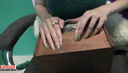 Claws scratching wood and leather hard - listen to this sound and look at the marks that my nails leave