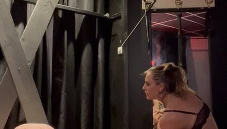 Mistress Tirza whipping hard with the cane