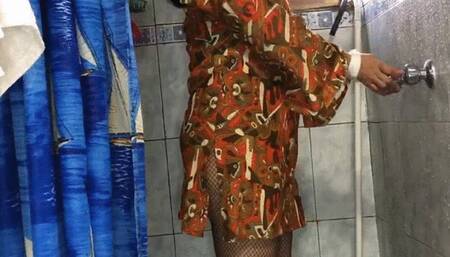 Julie takes a shower with her beautiful dress