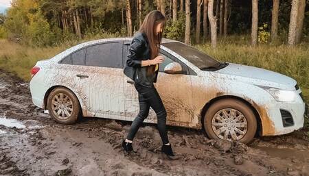 CAR STUCK Maria stuck playing with mud