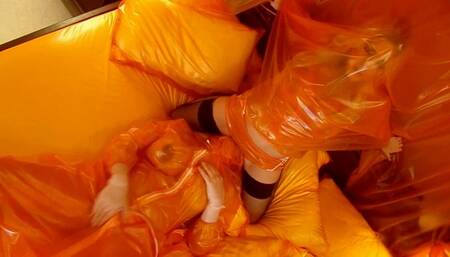Orange plastic fetish girls and the breath play overload