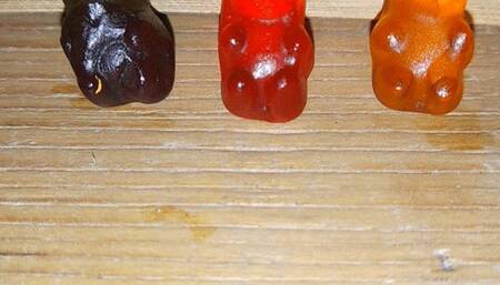 putting three teddy bears to sleep