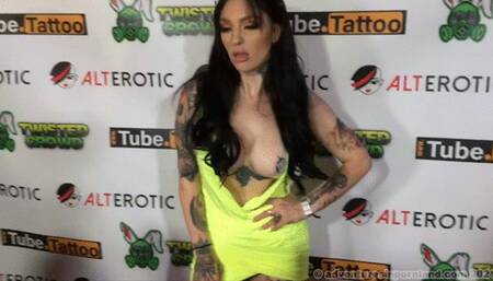 Misha Montana shows off her tattooed and pierced body showing her tits, and spreads her pussy and asshole at a party