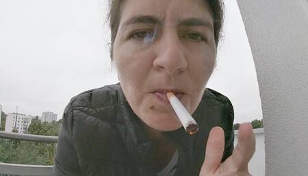 Dark pink lips and Marlboro