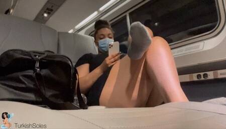 Public socks and soles on the train