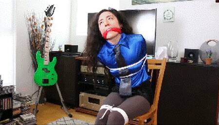 Khrystal is a businesswoman tied and gagged during the robbery of corporative secrets!