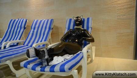 Kitty Klatsch goes swimming in heavy rubber