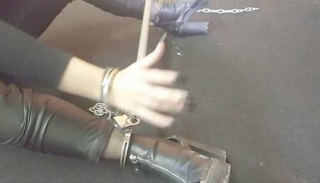 Laura in handcuffs spreader bar