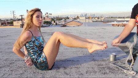 Janira tricked during  fake date, taken to a roof of a building and left tied up and gagged!