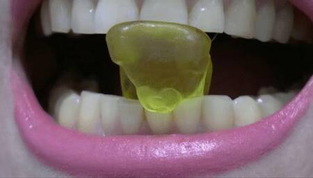 Bite the gummy bears heads off one by one with your razor sharp teeth MP4 FULL HD 1080p