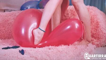 Q749 Mariette and Stashia slowly dip their bare feet into balloons till pop - 1080p