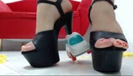 crushing 2 toy cars with 3 different shoes