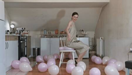 Alanna loves bursting balloons