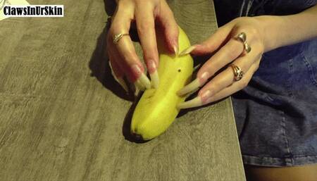 Scratching and clawing banana with my long claws