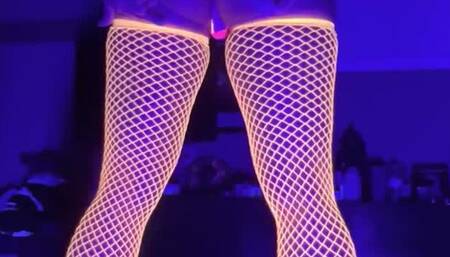 Lucy L'Vette dancing in neon bodysuit and fishnets