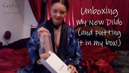 Unboxing my new dildo, and putting it in my box!